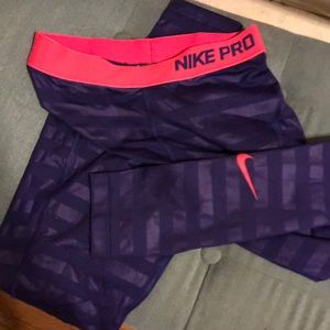 Pink and purple Nike full length